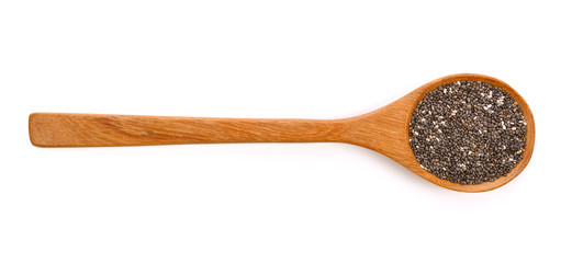 Chia seeds in a wooden spoon isolated on white top view