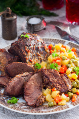 Baked beef with vegetables, selective focus