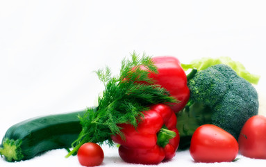 Various vegetables close to a white background