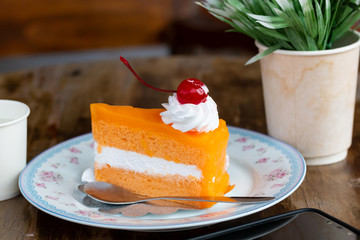 Delicious Orange cake in coffee shop