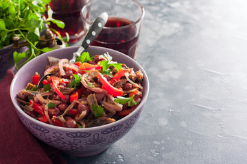 Salad from beef, red pepper, red beans, salad 