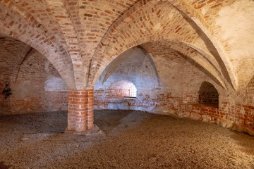 Old beautiful brick architecture with vaults and arches