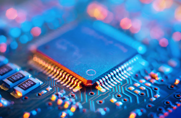 Computer Microchips and Processors on Electronic circuit board. Abstract technology...