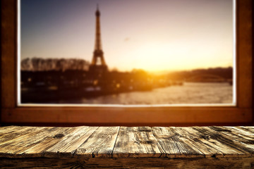 Table background and window sill space with Paris landscape 
