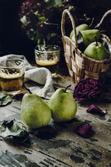 Pears on a dark wooden background, selective focus