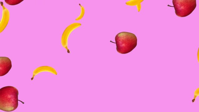 Beautiful Abstract Colorful Animation of Red Apples and Bananas Falling and Rotating Against Pink Background. Abstract background, 4K