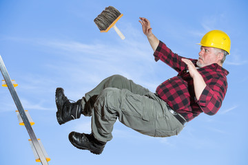 An older worker falls while working from a ladder