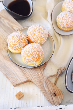 French dessert pastry. Mini tartes tropezienne on liight background