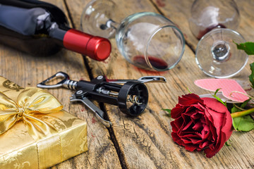 Red rose, wine set and gift box. Valentine's Day