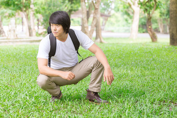 male tourist in the park. Tourism and travel concept, cargo pants