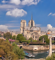 Fototapeta na wymiar Paris, Notre Dame cathedral with boat on Seine in France