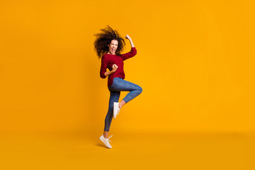Fototapeta na wymiar Full length body size view of her she nice crazy sporty attractive cheerful cheery ecstatic slim fit thin adorable wavy-haired lady satisfaction cool isolated on bright vivid shine orange background