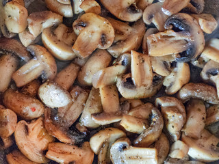 champignon mushrooms fried with spices and seasonings