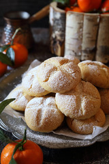 Homemade tangerine cookies and coffee in cezve