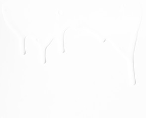 Milk streams on a white background