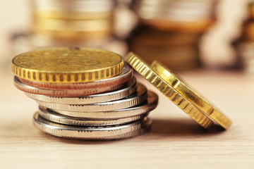 piles of coins on working table
