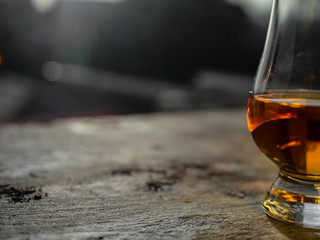 Irish Whiskey Glass Sunshine Shadow on Slate at Window Soft Focus