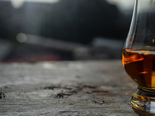 Irish Whiskey Glass Sunshine Shadow on Slate at Window