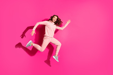 Full length body size photo jump high amazing she her lady hands arms help make electro dancing wearing casual pink costume suit pullover outfit isolated vibrant rose background