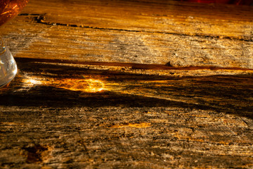 Irish Whiskey Glass Sunshine Shadow on Wooden Board