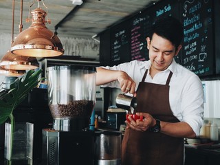 bartender pouring beer in a bar