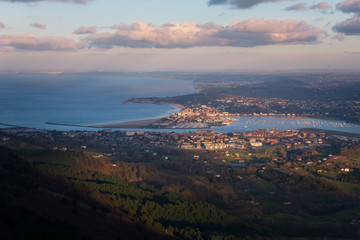 View from Txingudi bay with the mouth of Bidasoa river between Irun, Hondarribia and Hendaia at the Basque Country.