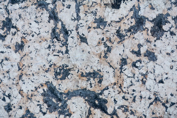 Detailed beige stone surface, texture of old natural spotted marble