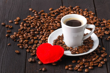 coffee with hearts on wooden table