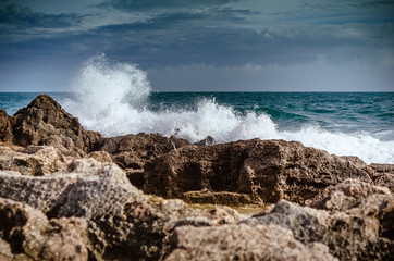 waves crashing on rocks