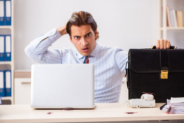 Businessman disgusted with cockroaches in the office