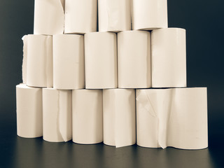tape of white paper for cash on a black background.