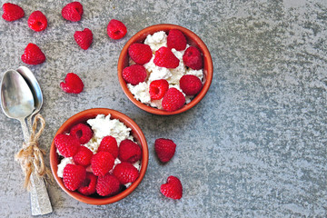 Healthy breakfast or snack with cottage cheese and fresh raspberries. Keto diet. Keto dessert or keto breakfast.
