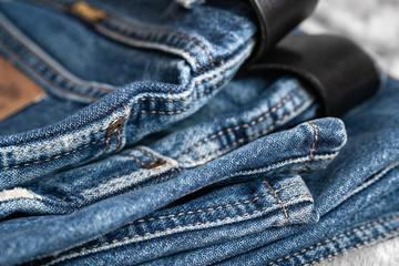 Blue jeans. Fragment of shabby cotton. Selective focus.