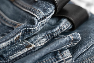 Blue jeans. Fragment of shabby cotton. Selective focus.