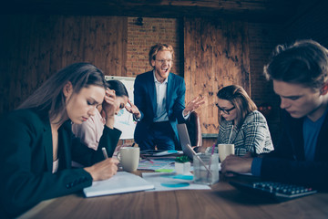 Close up photo business people he him his she her partners working office together boss angry anger yell mad crazy questions dressed suits formal wear mistakes noting every word
