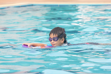 Boy Practice Swimming in pool
