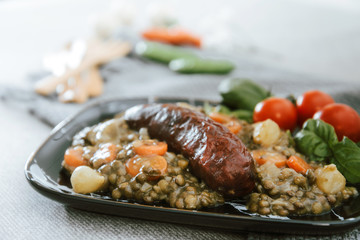 Homemade Sausage Cooked lentils with baby onions and carrots