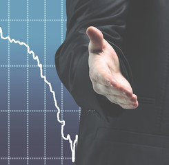 Fototapeta premium Business man with open hand ready to strike a deal amid growing graphics