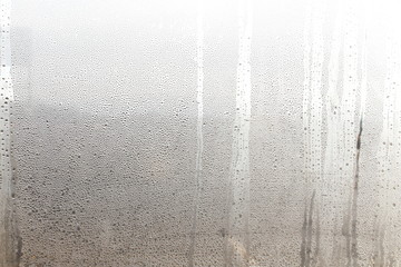 Water drops on window after rain natural texture as background