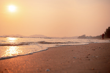 Beautiful cloudscape over the sea, The people are on the beach