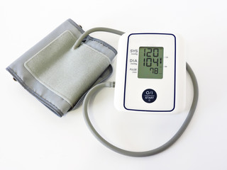 Digital Blood Pressure Monitor on white background. Close-up.Health and Medical concept .Cardiology. Tonometer and a manometer, stethoscope for diagnosis to measure of blood pressure and pulse.