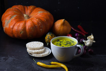 Pumpkin asian coconat cream soup. Autumn hot food