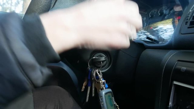 The Girl Starting The Car with the key