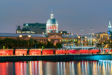 Twilight view of the Montreal skyline with Bonsecours Market