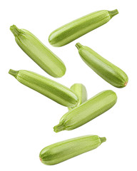 Falling zucchini isolated on white background, clipping path, full depth of field