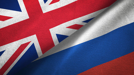 United Kingdom and Russia two flags textile cloth, fabric texture