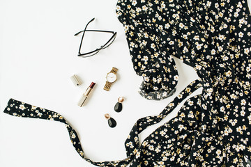 Fashion flatlay of modern female clothes and accessories on white background. Flat lay, top view.