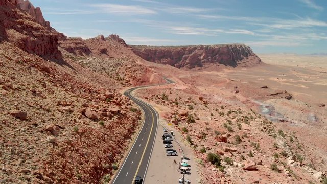 Aerial view of road crossing beautiful canyon, time lapse