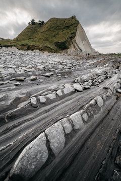 Landscape of rough stone shore