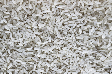Texture long grain rice. Rice groats.